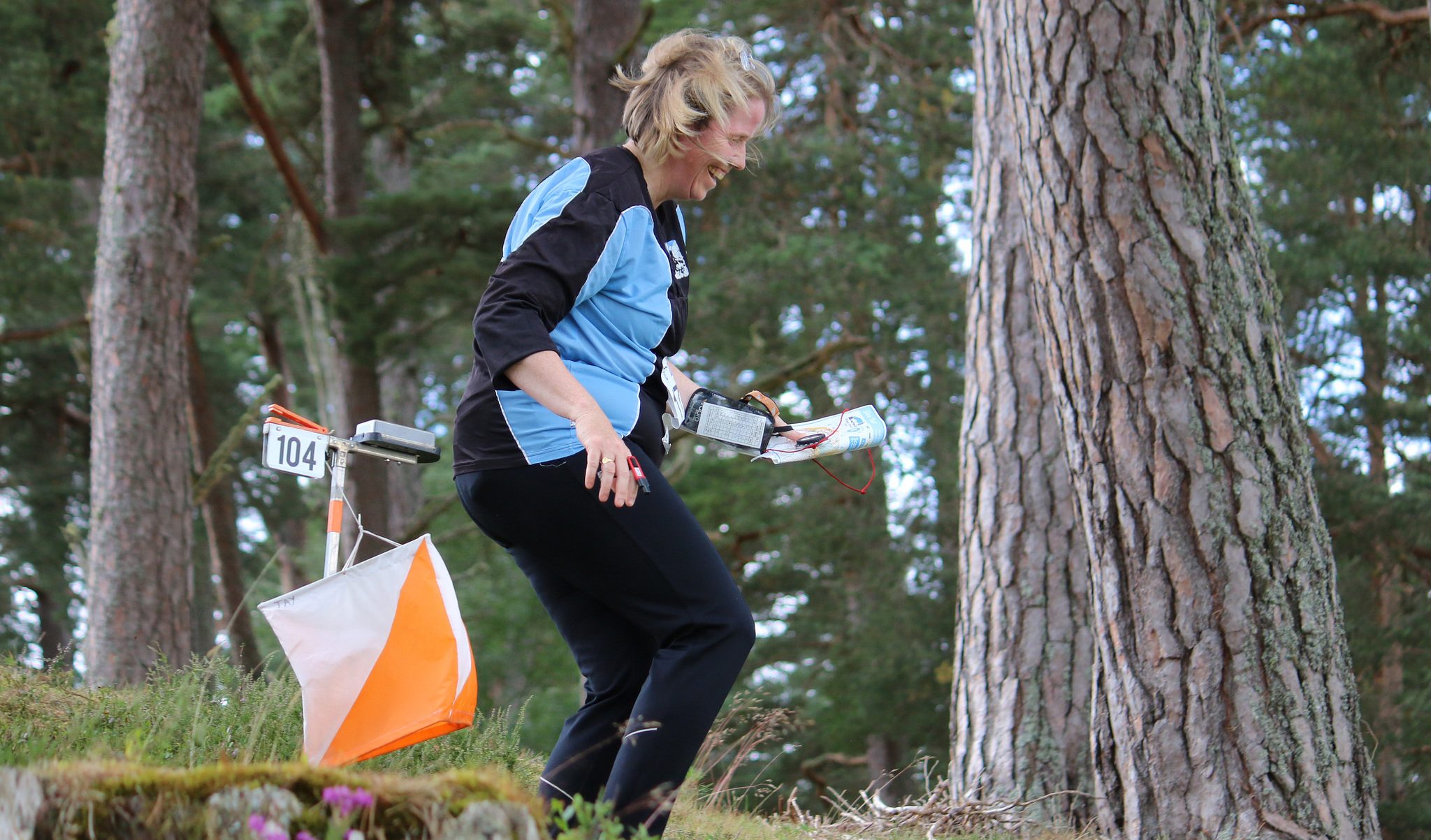 Orienteer enjoying the forests of the Scottish Outdoors